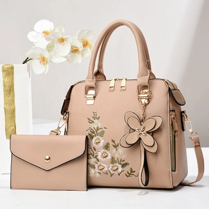 Pink PU leather handbag set with floral embroidery and gold hardware for women