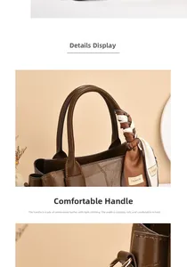 Detail of dark brown leather handbag handle with silk scarf and fine stitching crafts