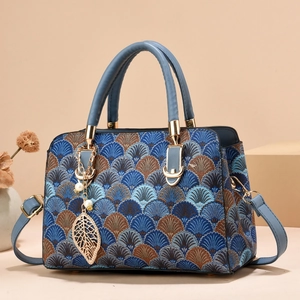 Fashionable shell-patterned top handle bag for women with blue leather strap and pearl charm
