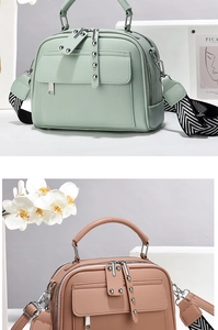 Detail of lychee pattern leather handbag with rivet decor and herringbone strap