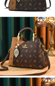 Detailed close-up of brown patchwork handbag with gold leaf charm and JANENOVO brand pattern