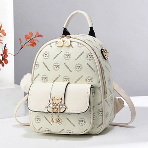 Cream vintage leather backpack for women with swan buckle and pearl pendant detail