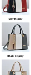 Detail der Haiweilu Handtasche mit goldenem Blattquasten und vertikaler Streifentextur