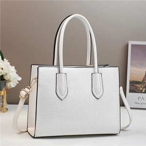 White crocodile pattern tote bag with gold hardware and removable shoulder strap