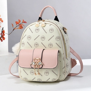 Beige leather backpack with pink accents, floral logo print and swan pearl tassel