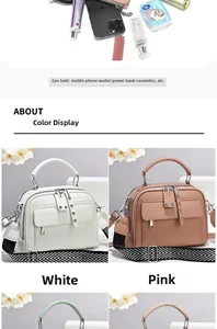 Detail view of large capacity crossbody bag with multiple layers and woven strap