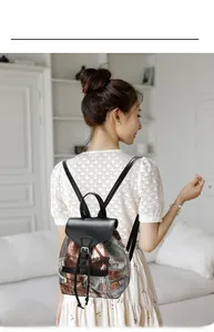 Vintage style multi-pocket backpack for women shown in back-carry view with model