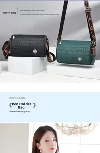 Macro detail of crocodile pattern texture on two barrel bags with wide floral straps