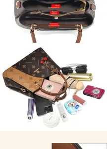 Detailed internal compartments of the vintage tote bag showing large storage capacity