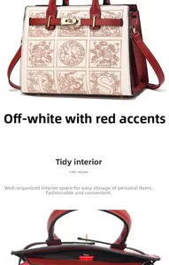 Detail view of cream and red leather handbag with floral embroidery and gold turn-lock
