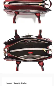 Detailed interior of red leather handbag showing multi-compartment storage and organization