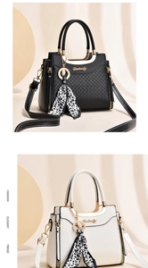 Detail of diamond lattice pattern on handbags with golden hardware and leopard scarf