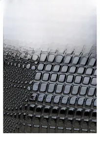 Macro texture of black croco-embossed cowhide leather and high-quality PU material