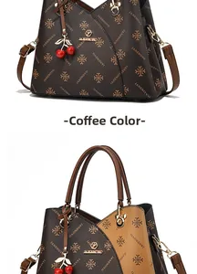 Detail view of large tote bags with classic monogram print and red cherry charm