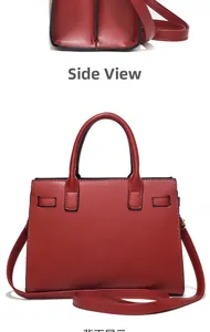 Front and side view of a burgundy leather tote bag with round handles and strap