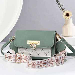 Trend crossbody bag with heart buckle and ethnic style wide strap in green and cream