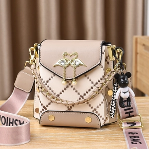 Beige and brown crossbody bag with golden swan pearl lock and pink fashion strap