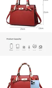 Size specifications and capacity detail of the red PU leather trapezoid handbag with scarf
