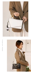 Detail of minimalist shoulder bags featuring gold chain handles and leather straps
