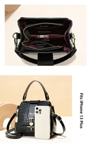 Internal compartments and size reference of black crocodile pattern bucket bag
