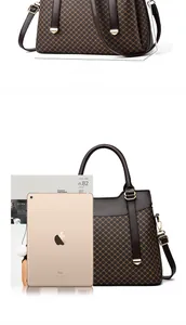 Detail of dark brown leather handbag showing 30cm size and internal storage capacity