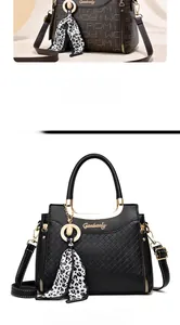 Close-up of elegant handbags with leopard scarf detail and quilted texture for women