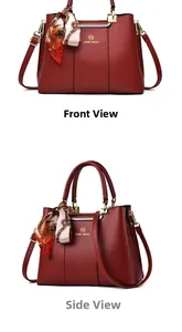Front and side view of a red leather tote bag with a floral scarf and gold metal hardware