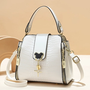 White crocodile pattern bucket bag with Mickey head buckle and golden star charms