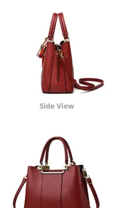 Detail view of red leather handbag with gold hardware and decorative silk scarf