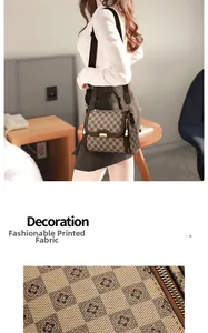 Détail du tissu à carreaux marron vintage avec zip doré et large bandoulière réglable
