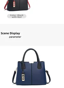 Détail des couleurs montrant le contraste noir et rouge et les sacs en cuir grainé bleu marine