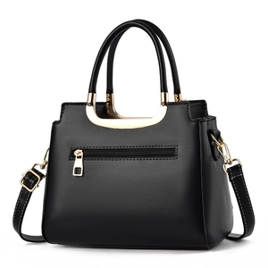 Elegant black faux leather handbag with gold hardware and detachable shoulder strap