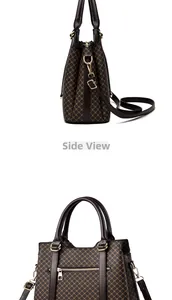 Side view detail of a classic brown textured handbag with adjustable strap and gold hardware