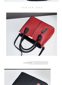 Vue détaillée du sac cabas rouge et noir avec texture litchi et finitions dorées