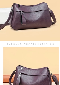 Detail view of purple leather shoulder bag showing elegant texture and zipper finish