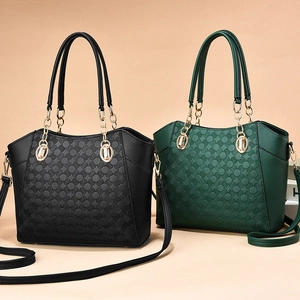 Set of large PU leather tote bags in black and dark green with circular embossed texture