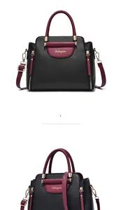 Détails d'un sac bandoulière bicolore avec ferrures dorées et bandoulière amovible