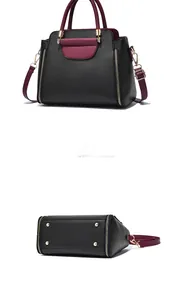 Détails du sac avec quatre pieds de protection dorés et fermeture éclair latérale décorative