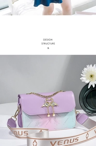Detail of lavender gradient crossbody bag with golden swan clasp and Venus strap