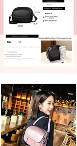 Close-up of litchi texture PU leather crossbody bag with double zippers and adjustable strap