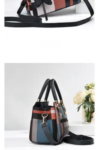 Detailansicht der geometrischen Patchwork-Handtasche mit Riemen und Griffen