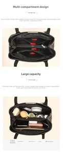 Detail view of large capacity black leather handbag featuring five functional compartments