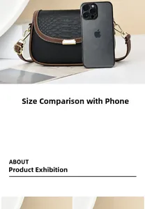 Size comparison of black embossed crossbody bag with phone for scale perspective