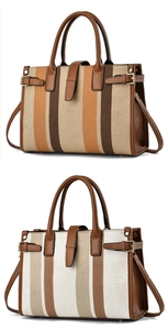 Close-up of canvas tote bags with striped patterns and premium brown leather trim details