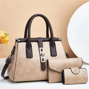 Three-piece beige PU leather handbag set with contrasting brown handles and hardware