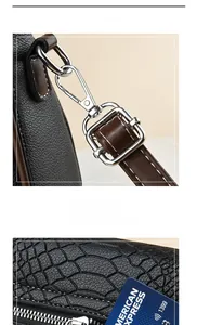 Detail of crossbody bag featuring silver metal clasp and crocodile texture leather