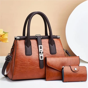Three-piece brown faux leather tote bag set with lychee texture and silver hardware
