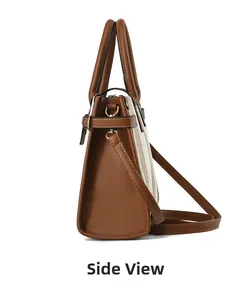 Side view of brown leather and beige woven tote bag with adjustable shoulder strap