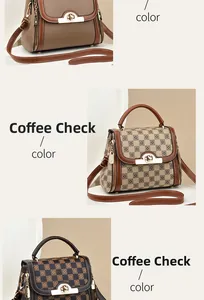 Detail view of women's crossbody bags featuring metal turn-lock closure and canvas texture