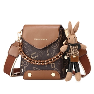 Retro brown拼接 crossbody phone bag with chain strap and cute bunny doll charm